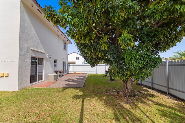 view of yard featuring a fenced backyard and a patio