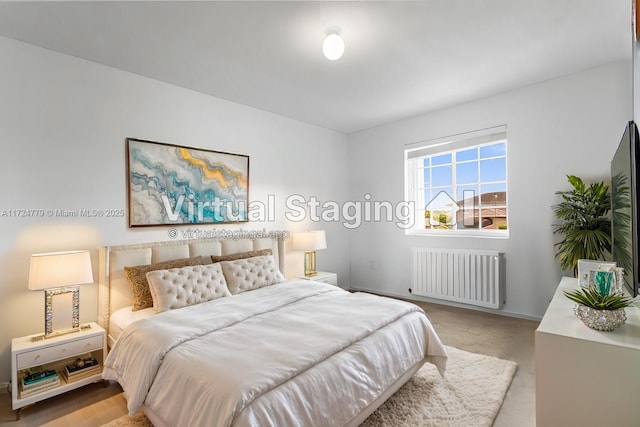 bedroom featuring radiator