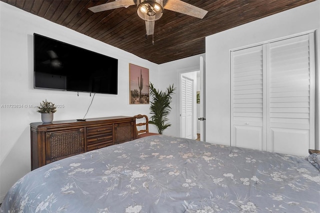 unfurnished bedroom with a closet, ceiling fan, and wood ceiling