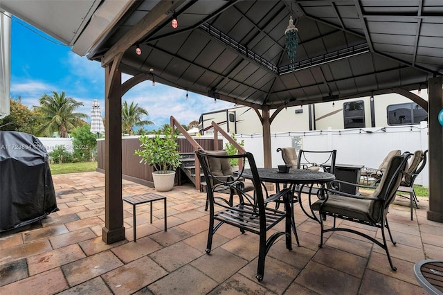 view of patio featuring a gazebo and area for grilling