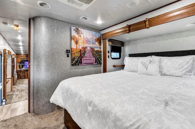 bedroom featuring carpet flooring and crown molding