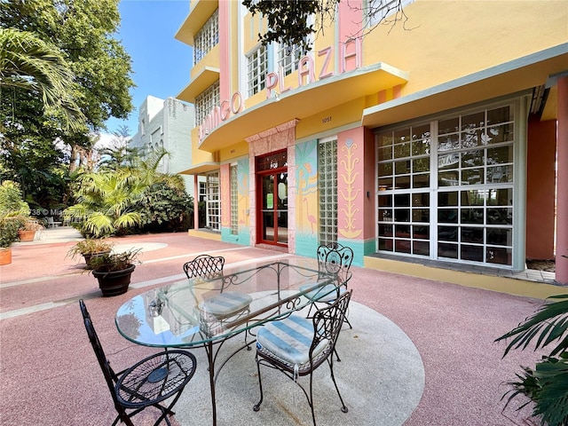 view of patio / terrace featuring french doors and outdoor dining area