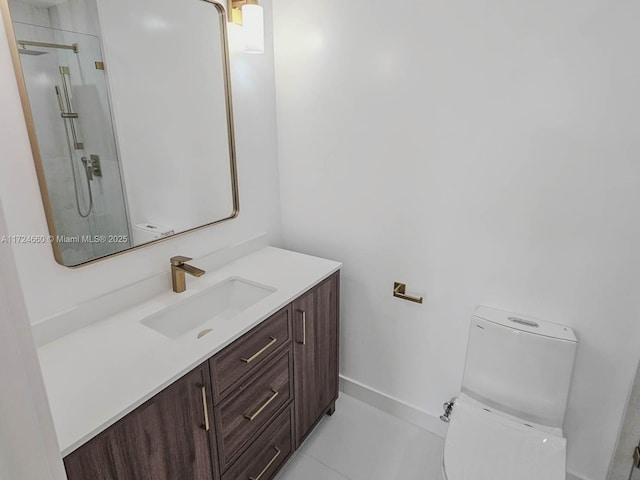 bathroom with tile patterned flooring, vanity, an enclosed shower, and toilet