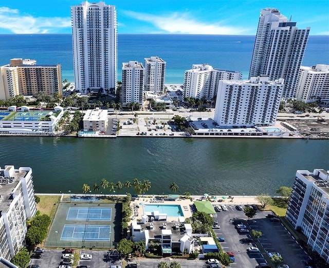 birds eye view of property featuring a water view