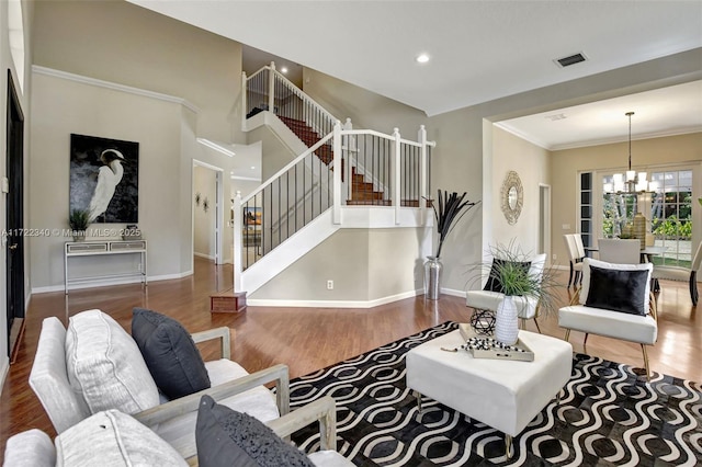 1781 Harbor Pointe Cir, Weston, FL 33327 - living room featuring wood-type flooring, a notable chandelier, and crown molding