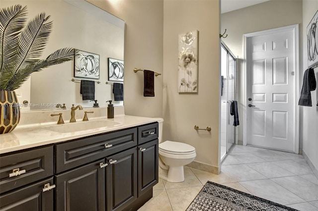 1781 Harbor Pointe Cir, Weston, FL 33327 - bathroom featuring an enclosed shower, vanity, tile patterned floors, and toilet