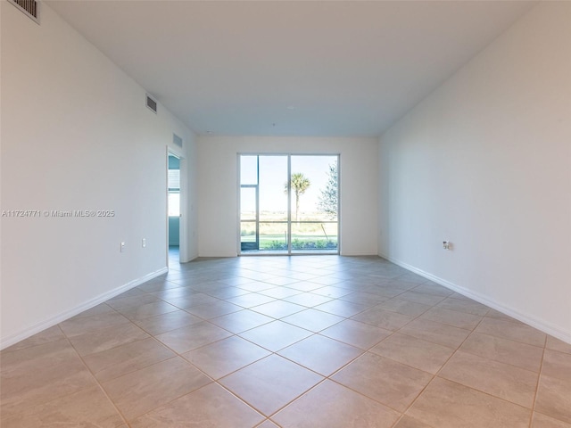 view of tiled empty room