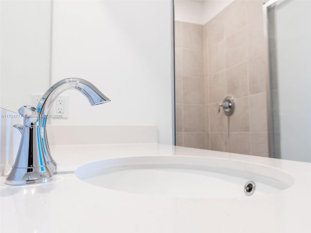 bathroom with a tile shower