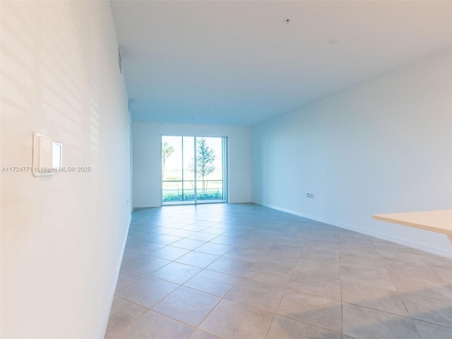 view of tiled spare room