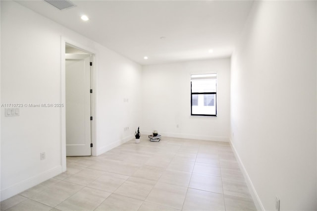 view of tiled spare room