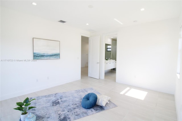 empty room with light tile patterned flooring