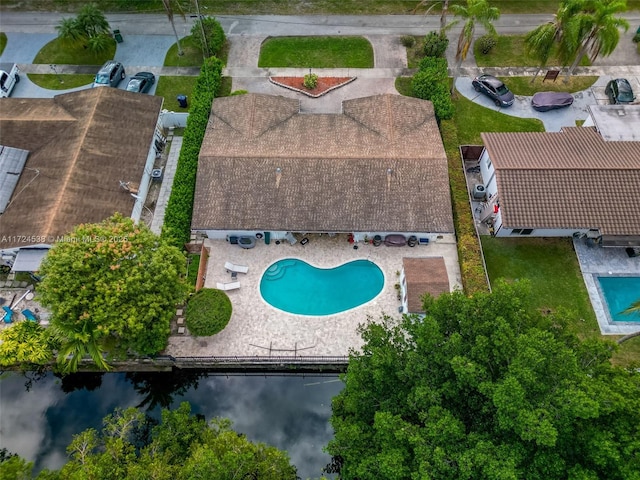 drone / aerial view featuring a water view