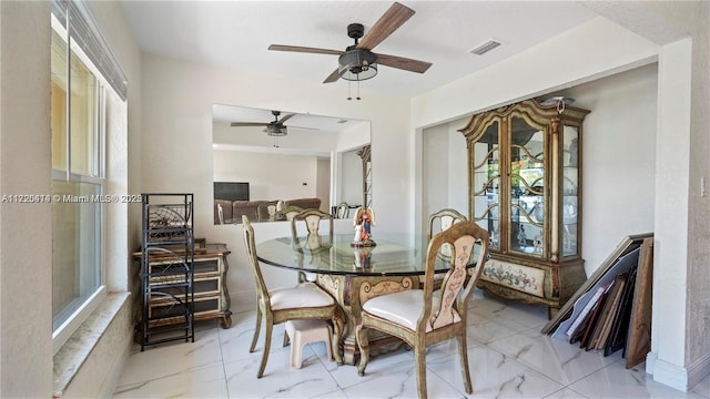 dining room with ceiling fan