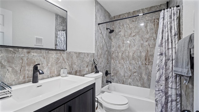 full bathroom with vanity, decorative backsplash, toilet, shower / bathtub combination with curtain, and tile walls