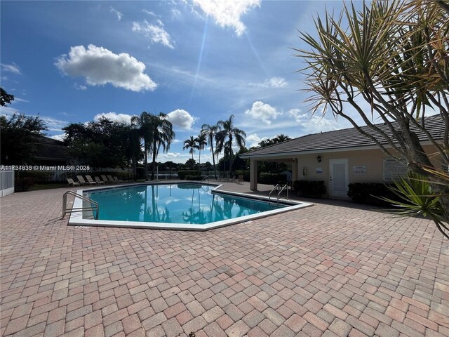 view of pool featuring a patio