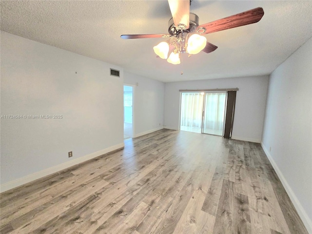 bathroom with tile patterned floors, vanity, toilet, and an enclosed shower