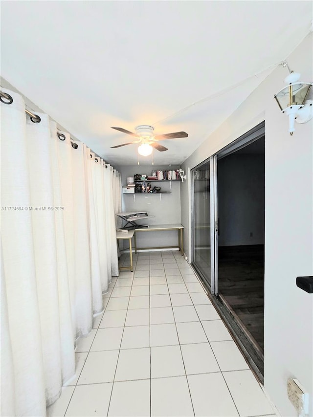 hallway with light tile patterned floors