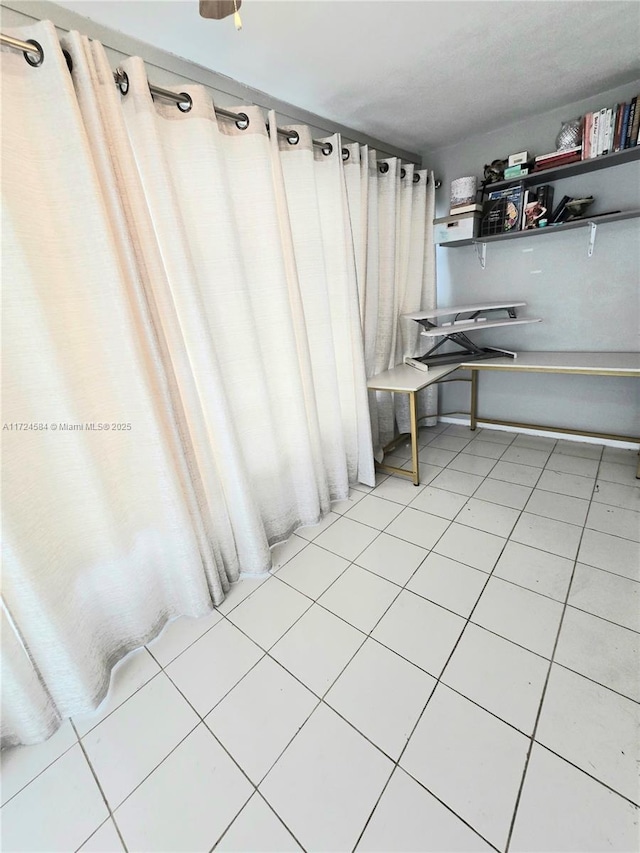 interior space featuring light tile patterned floors