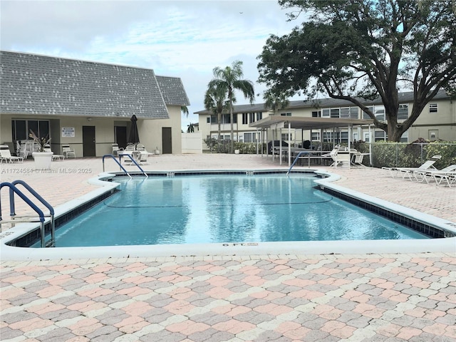 view of pool featuring a patio