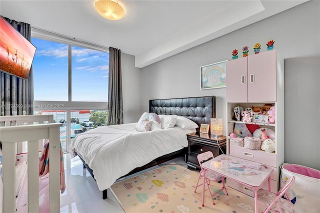 bedroom with expansive windows