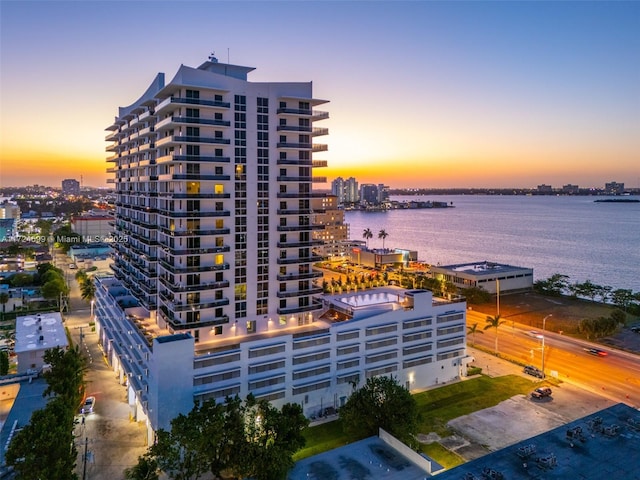 exterior space featuring a city view and a water view