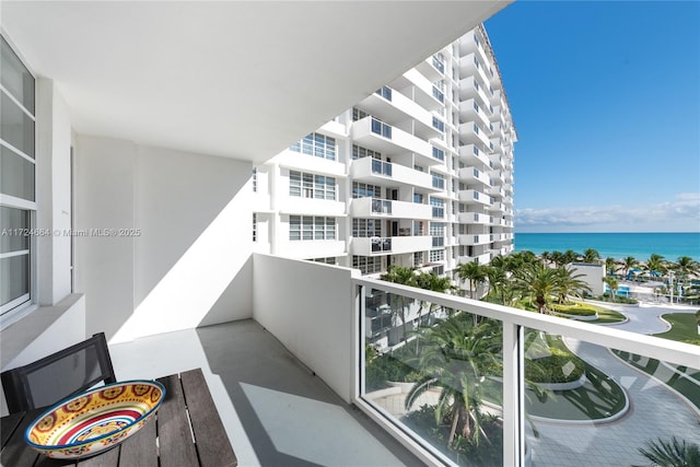 balcony featuring a water view