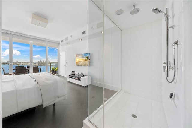 bathroom with walk in shower, expansive windows, and tile patterned floors