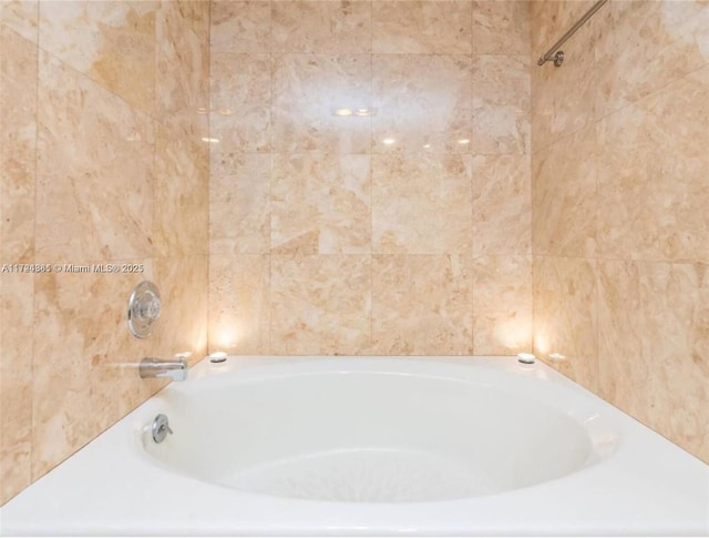 bathroom featuring a tub