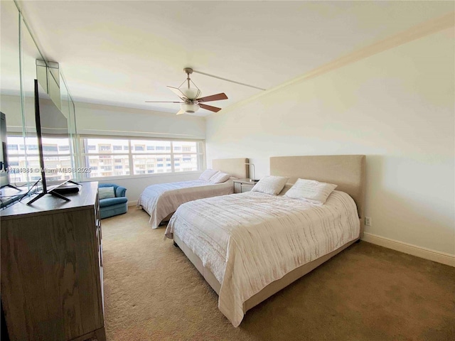 bedroom featuring carpet and ceiling fan