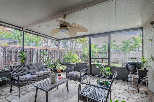 sunroom / solarium with ceiling fan