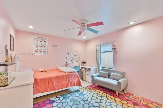 tiled bedroom with ceiling fan