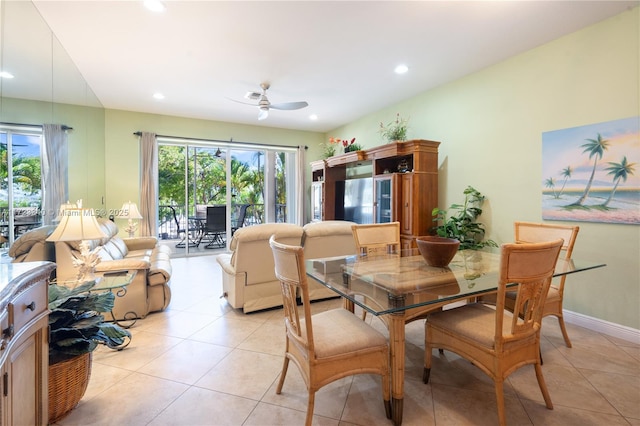 tiled dining area with ceiling fan