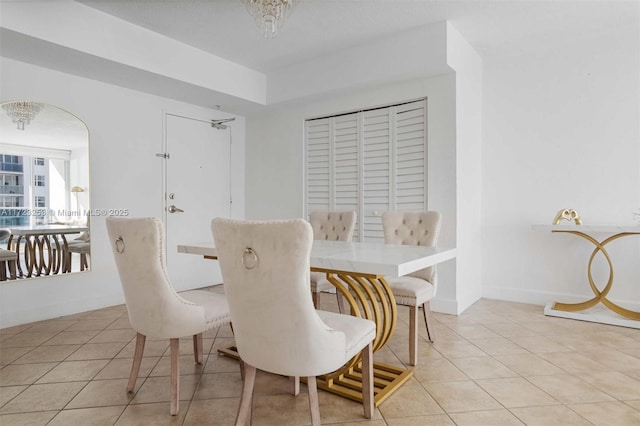 dining space with light tile patterned floors