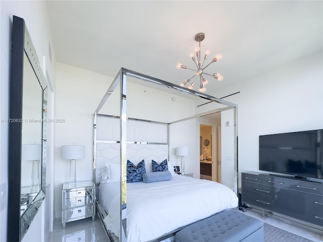 bedroom with a notable chandelier