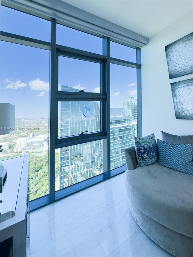 living room with a wall of windows