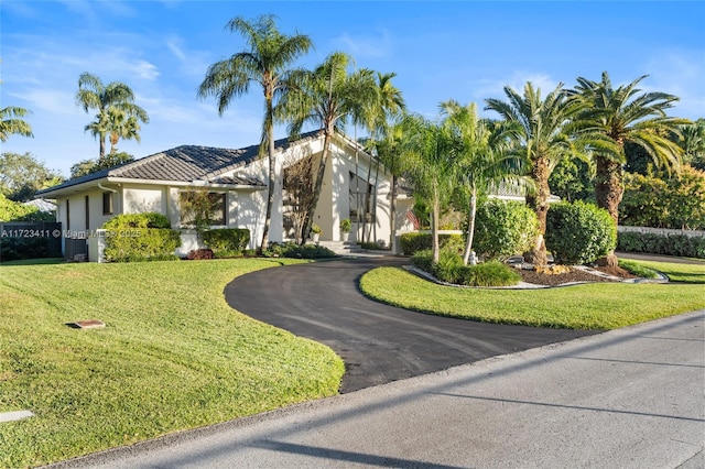 view of front of property with a front lawn