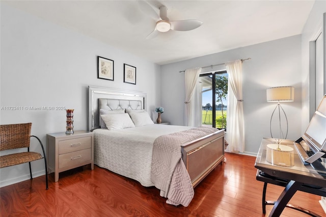 bedroom featuring ceiling fan and hardwood / wood-style floors