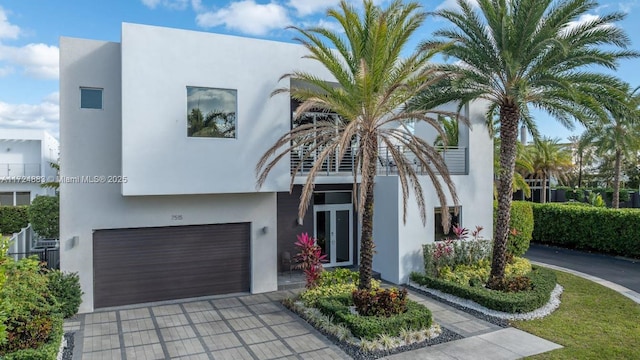 view of front of home with a garage