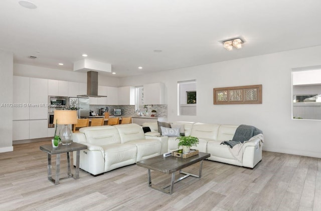 living room featuring light hardwood / wood-style floors