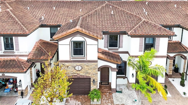 view of front of home with a garage