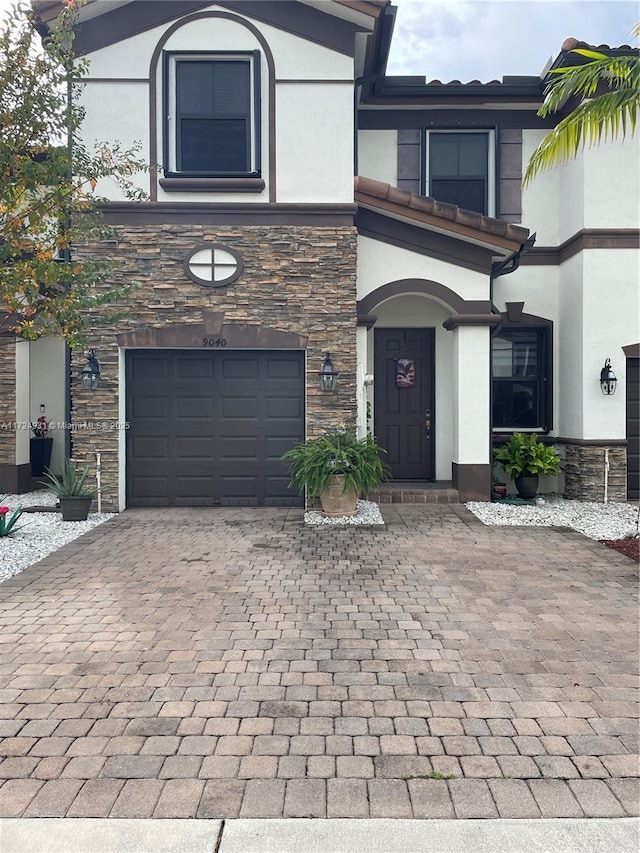 view of front of home with a garage