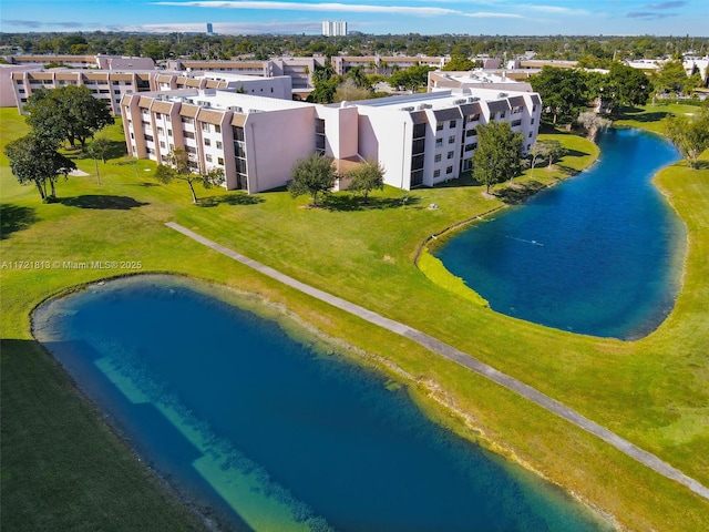 aerial view featuring a water view and a view of the beach