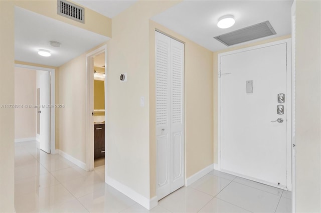 view of tiled entrance foyer