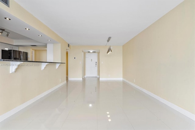 interior space featuring light tile patterned flooring