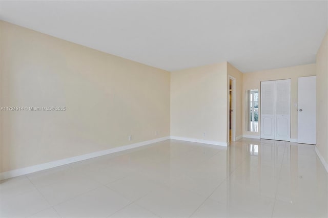 view of tiled spare room