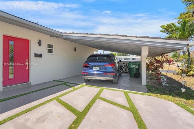 15100 SW 89th Ct, Palmetto Bay, FL 33176 - view of vehicle parking featuring driveway and an attached carport