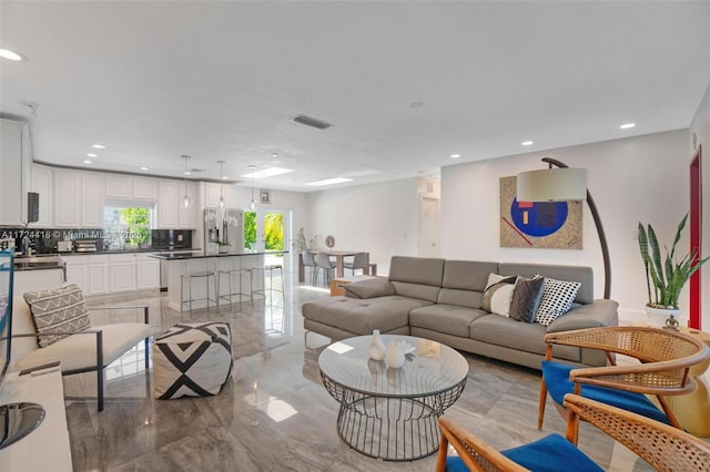 15100 SW 89th Ct, Palmetto Bay, FL 33176 - living area with recessed lighting, visible vents, and marble finish floor