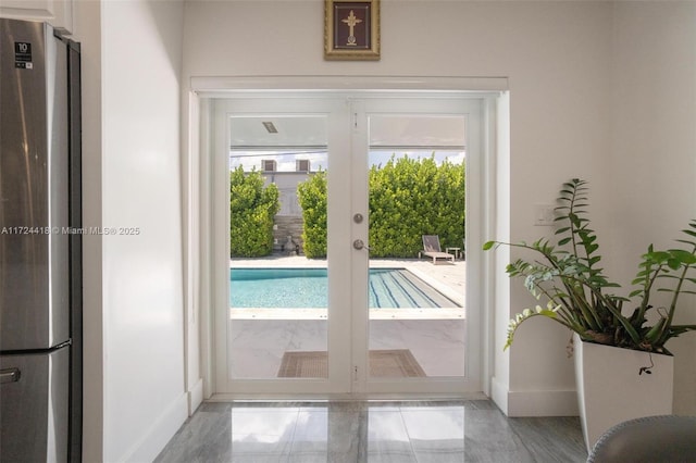 15100 SW 89th Ct, Palmetto Bay, FL 33176 - entryway featuring baseboards and french doors