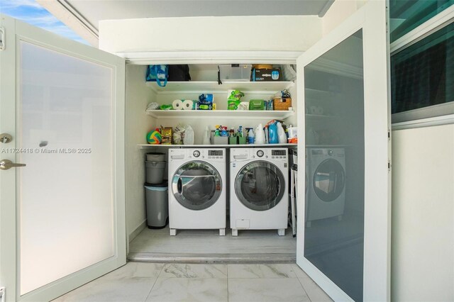 15100 SW 89th Ct, Palmetto Bay, FL 33176 - washroom with laundry area, washing machine and dryer, and marble finish floor