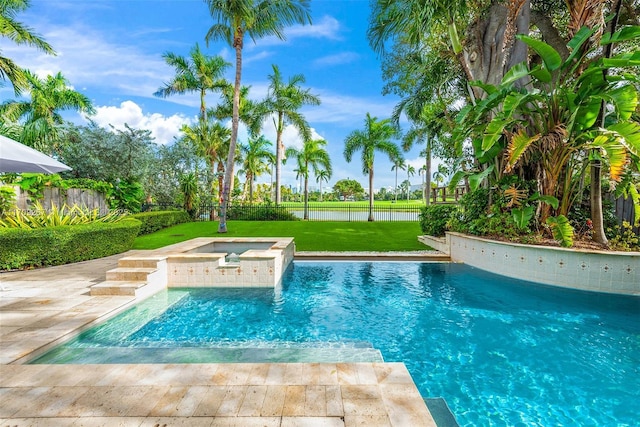 view of pool featuring an in ground hot tub